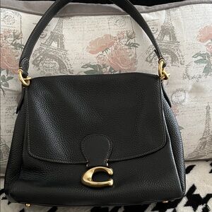Coach Black Leather Handbag with Gold Accents